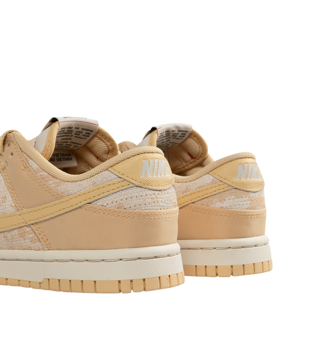 Image 3 of 5 - BROWN - NIKE Dunk Low Sneakers featuring upper that softens and gains vintage character with wear, foam midsole offers lightweight, responsive cushioning and rubber outsole with classic pivot circle adds durable traction and heritage style.