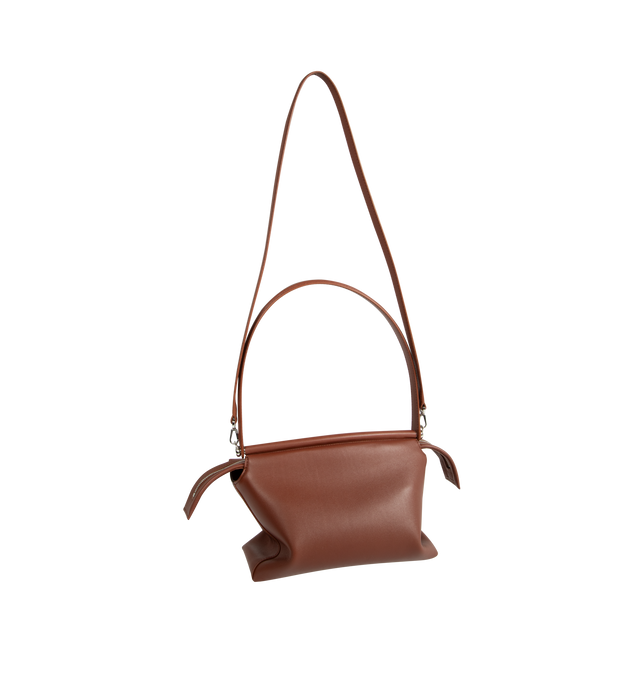 Image 2 of 3 - BROWN - Loewe Small Whisker Bag is crafted from black glazed calfskin and features a slouchy silhouette with a structured handle and oversized zip opening. Designed for shoulder, crossbody, or hand carry, it includes a detachable strap with rotating dog clips, articulated zipper pulls, foldable D-rings, an exterior flat pocket, and an interior flat pocket. Gold-tone hardware and embossed Loewe and Double L branding complete the design. Fits a large phone, small wallet, sunglasses, and keys. M