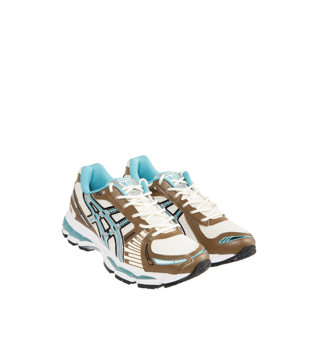 Image 2 of 5 - BROWN - ASICS Gel-Kayano 12.1 Sneaker featuring breathable mesh underlays, GEL-NIMBUS17 tooling system, FLUIDRIDE technology, rearfoot and forefoot GEL technology and dope dyed recycled sockliner mesh.