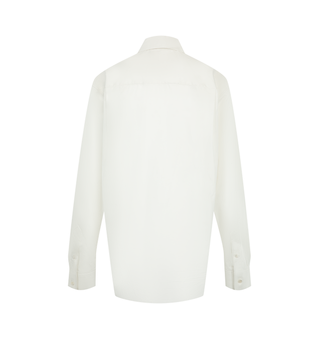 Image 2 of 2 - WHITE - The Row Women's Gavina Shirt featuring classic button-up shirt in smooth sea island cotton chambray with front patch pocket, slim back yoke and exposed front button placket. 100% cotton. Made in Italy.