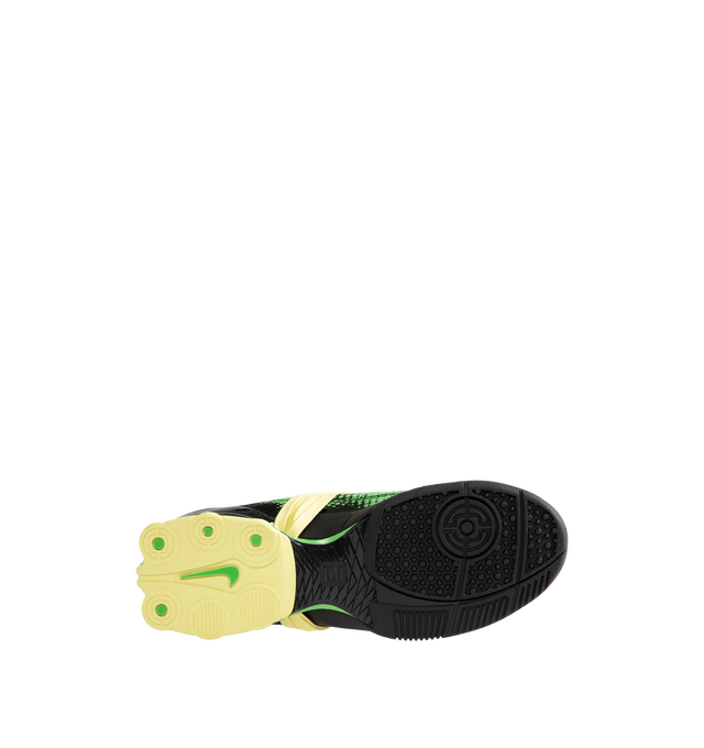 Image 4 of 5 - GREEN - Nike Women's Total 90 Shox Magia Sneakers feature a premium nubuck leather upper with oversized laces and printed graphic detailing, combining the iconic design of the Total 90 with a sleek, tonal finish. Inspired by early-2000s soccer style, these lifestyle sneakers pair signature Nike Shox cushioning with a durable rubber outsole for responsive comfort and everyday wear. Main Material: Nubuck Leather. Midsole: Nike Shox. Sole: Rubber.