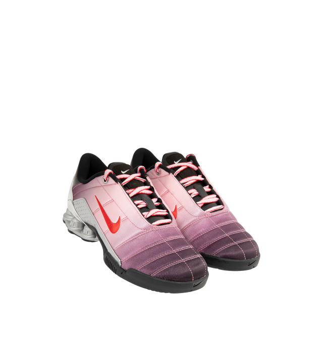 Image 2 of 5 - PINK - Nike Womens Shox Magia Sneakers feature a premium leather and textile upper. Designed with a lace-up closure, metallic accents, Nike Shox cushioning columns, and durable rubber outsole. Upper: Leather and Textile; Cushioning: Nike Shox; Outsole: Rubber. Imported