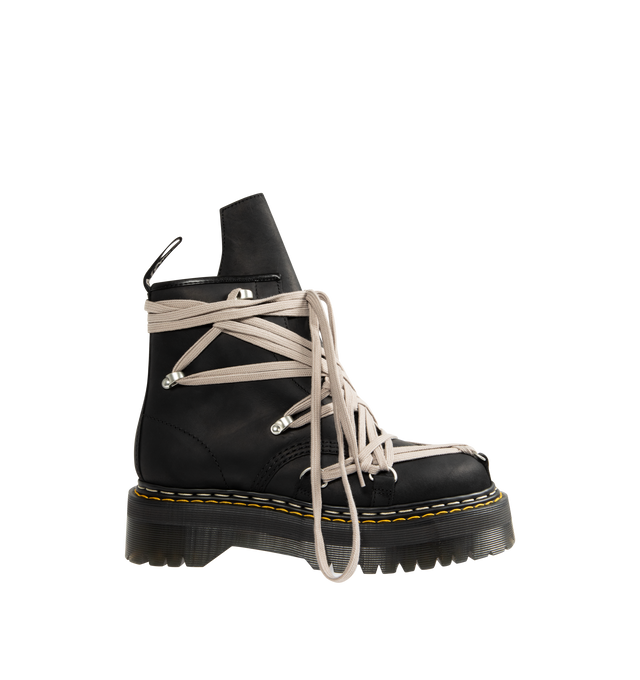 Image 1 of 4 - BLACK - RICK OWENS X DR. MARTENS Megalace Leather Platform Boots featuring signature megalacing system across the black, waxy leather upper with an extended geometric tongue, an easy-access inner zip, special edition AirWair heel loop and stacked on imposing Quad sole with a white and yellow double welt stitch.