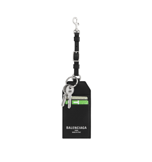 Image 1 of 3 - BLACK - BALENCIAGA Credit Keychain Card Holder featuring grained calfskin, keychain card holder, Balenciaga Paris logo debossed with foil at front, BB and Balenciaga logo engraved, aged-silver hardware, comes with 2 fake cards with logo printed, 1 snap hook, 3 card slots and 1 split ring with charms attached. Calfskin. Made in Italy.