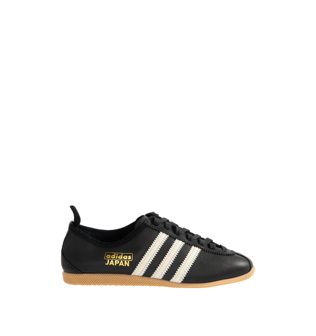 Image 1 of 5 - BLACK - ADIDAS Japan Sneaker featuring regular fit, laces, leather upper, leather lining, rubber outsole, low-profile T-toe design and signature archive branding.