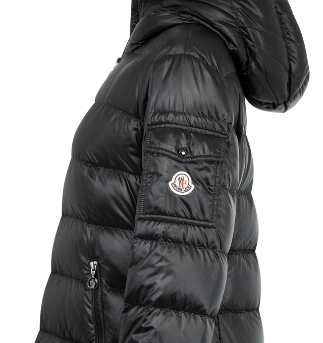 Image 3 of 3 - BLACK - MONCLER Glements Hooded Mid-Length Down Jacket featuring longue saison lining, down-filled, hood, zipper closure, zipped pockets, sleeve pocket with snap button closure and adjustable cuffs. 100% polyamide/nylon. Padding: 90% down, 10% feather. Made in Moldova.