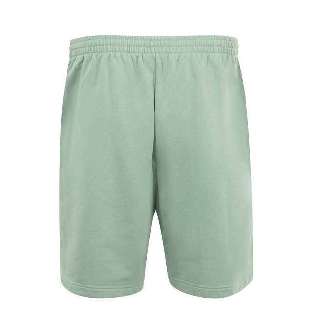 Image 2 of 3 - GREEN - BALENCIAGA Back Reflective Shorts featuring dry fleece, mid-waist, elasticated waistband, drawstring waist, 2 slash pockets at front, Balenciaga Back logo embroidered on left front leg and reflective effect artwork. 100% cotton. Made in Portugal.