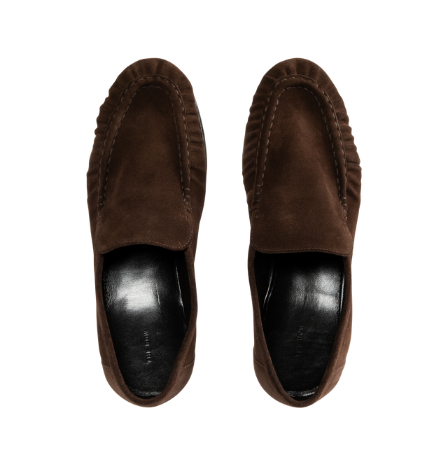 Image 4 of 4 - BROWN - THE ROW Soft Moccasin Two featuring moccasin loafer in soft calfskin suede with oval toe, topstitched front detailing with natural pleating effect and stacked leather heel. 100% calfskin suede. Lined in 100% goatskin leather. Calfskin leather sole. Made in Italy.