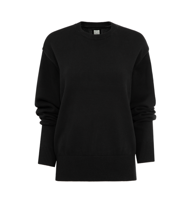 Image 1 of 2 - BLACK - TOTEME Crew Knit Sweater featuring long sleeves, crewneck, ribbed cuffs and hem and regular fit. 100% organic cotton.