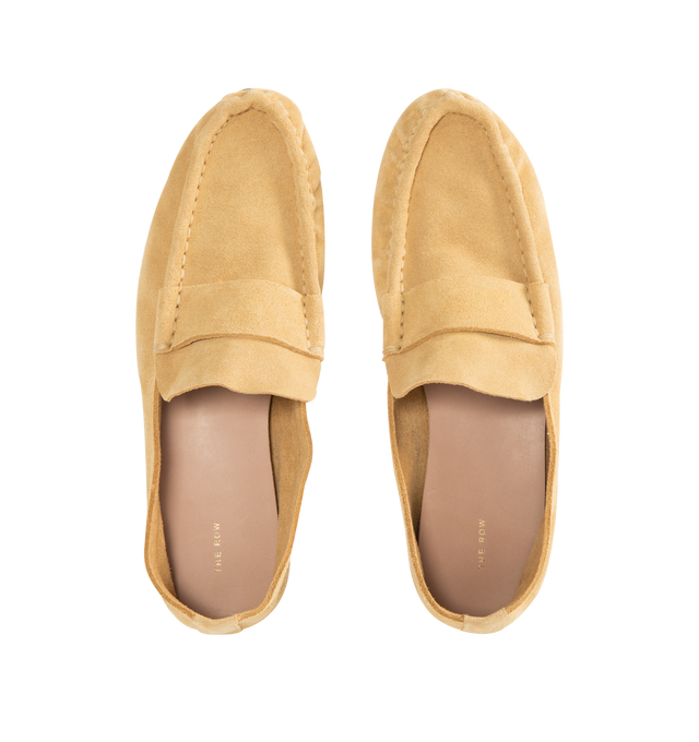 Image 4 of 4 - NEUTRAL - The Row Lightweight moccasin in soft calfskin suede with oval toe, stitched vamp strap, and stacked 0.39" heel. 100% Calfskin Suede with leather sole. Made in Italy.