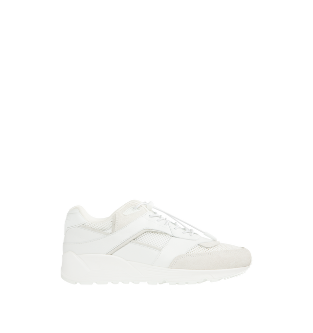 Image 1 of 5 - WHITE - SAINT LAURENT Bump Sneakers in smooth leather and suede featuring low-top, drawstring laced sneakers with a rubber SAINT LAURENT signature on the tongue and back tab. Calfskin, rubber. Made in Italy.