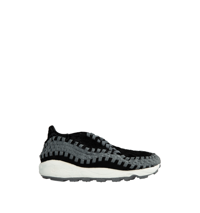 Image 1 of 5 - BLACK - NIKE Air Footscape Sneakers featuring graphic pattern printed throughout, offset lace-up closure, logo embroidered at tongue and heel counter, logo embossed at heel, suede lining, foam rubber midsole and treaded rubber outsole. 