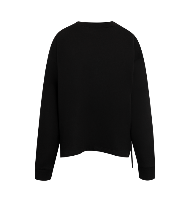 Image 1 of 2 - BLACK - THE ROW Amira Top featuring ribbed trim, side slits at hem, crew neck and long sleeves. 100% cotton. Made in Italy.