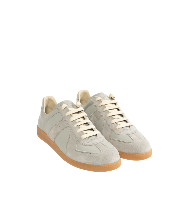 Image 2 of 5 - GREY - MAISON MARGIELA Replica Sneakers featuring lace-up sneakers in buffed nappa calfskin and calfskin suede, contrasting sole, Maison Margiela logo label on the tab, internal Replica label, internal elastic and all-over Maison Margiela logo insole. 100% calf leather. Sole: 100% rubber. Made in Italy.