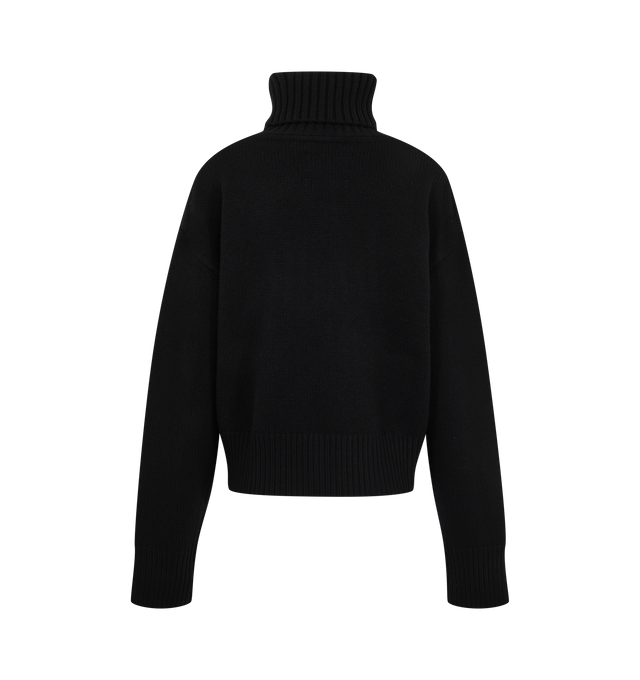 Image 2 of 2 - BLACK - Extreme Cashmere Women's Crop Xtra Sweater is crafted from cashmere and features a cropped silhouette, drop shoulders, and a plush heavy-knit construction. Designed with a cozy turtleneck, this relaxed style is finished with ribbed detailing at the neckline, cuffs, and hem for a refined everyday fit. Main Material: 100% Cashmere.