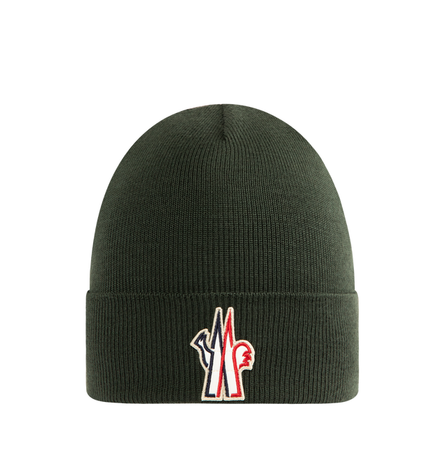 Image 1 of 2 - GREEN - MONCLER Wool Beanie featuring ultra-fine wool, rib knit and gauge 7. 100% virgin wool. Made in Italy.