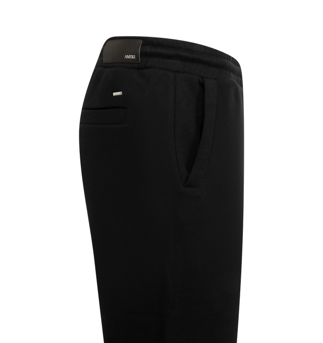 Image 3 of 3 - BLACK - AMIRI Club Amiri Sweatpants featuring wide-leg, elastic drawstring waist, side-seam pockets and logo on front. 52% polyester, 48% cotton. Made in Italy.