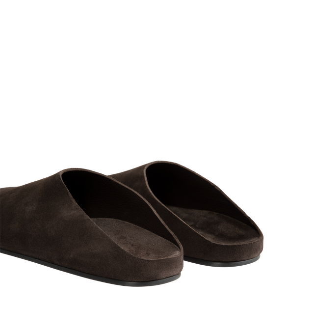 Image 3 of 4 - BROWN - The Row Men's Hudson Slide is crafted from natural suede calfskin leather and features a relaxed slip-on silhouette with a round toe, contoured footbed, and lightweight synthetic sole. Designed for everyday comfort, this refined sandal combines premium materials with understated styling and is finished with a subtle elevated profile. Main Material: 100% Calfskin Leather. Footbed: Contoured. Sole: Synthetic. Toe: Round. Heel Height: 1.25 in. *Fit: Runs Slightly Small; We Recommend Orde