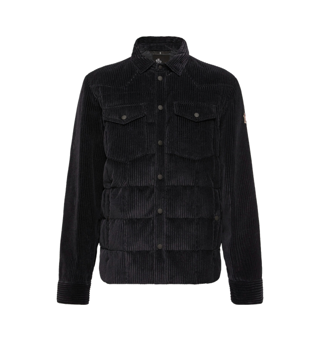 Image 1 of 1 - NAVY - Moncler Grenoble Men's Gelt Down Shirt Jacket is crafted from stretch corduroy and features a shirt jacket silhouette, a classic collar, down-filled insulation, and a snap-button front closure. Designed to blend tailored style with outdoor functionality, this versatile layer is finished with a micro ripstop lining, snap-button flap pockets, and adjustable cuffs for enhanced comfort during trekking, hiking, and everyday wear. Main Material: 98% Cotton, 2% Elastane. Lining: 100% Polyeste