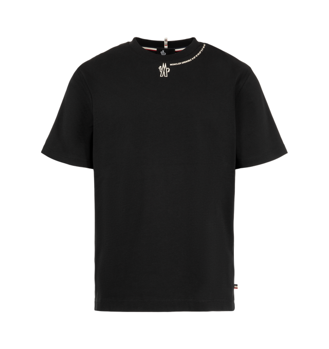Image 1 of 1 - BLACK - Moncler Men's Cotton Jersey Logo T-Shirt is crafted from cotton jersey and features a slim-fit silhouette, a ribbed crew neckline, short sleeves, and side slits for ease of movement. Designed for both urban and outdoor wear, this versatile essential is finished with embossed logo detailing that adds subtle signature branding. Main Material: 100% Cotton.