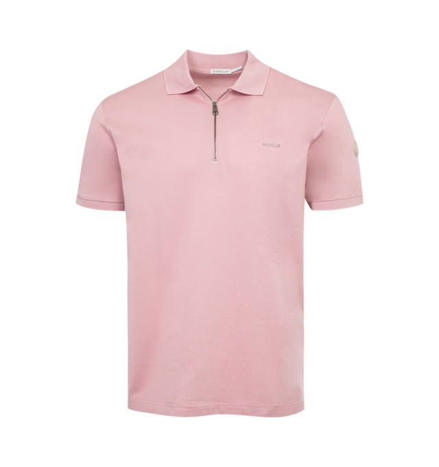 Image 1 of 2 - PINK - MONCLER Zip Up Polo Shirt featuring short sleeves, tonal knit collar and cuffs, zipper closure, embossed logo lettering and synthetic material logo patch. 
