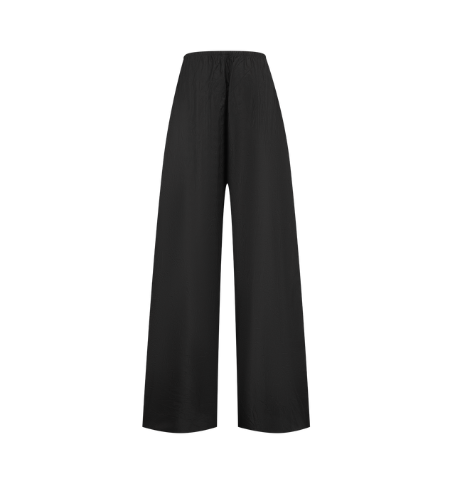 Image 2 of 2 - BLACK - The Row Women's Silk Taffeta Pants are crafted from luxurious silk taffeta and feature a bias-cut construction with a slim gathered elastic waistband and a fluid wide-leg silhouette. Designed to sit low at the natural waist, these designer silk pants combine exceptional Italian craftsmanship with an effortlessly relaxed drape, making them a refined choice for elevated everyday or evening wear. Main Material: 100% Silk. Made in Italy.