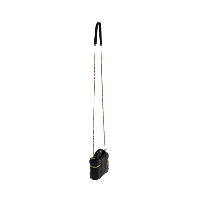 Image 2 of 3 - BLACK - Saint Laurent micro version of the GABY vanity sized to fit small items such as AirPods, keys, lipstick, and cards. Decorated with the CASSANDRE and diamond-quilted overstitching. Crafted from Lambskin and fully lined in leather, featuring a detachable chain strap for multiple carry options, bronze-toned hardware, zip closure, one card slot. Measures 4.7" x 3.1" x 1.6" with 1.8" handle drop and 21.7" strap drop. Made in Italy