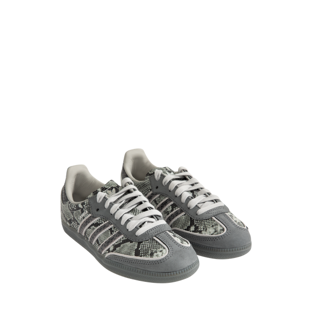 Image 2 of 5 - GREY - Adidas Men's Samba OG Snake-Effect Sneakers are crafted from calf leather. Features a snake-effect finish, round toe, lace-up closure, signature 3-Stripes, logo-print tongue, branded heel counter, and flat rubber sole. Upper: Calf Leather; Lining: Calf Leather; Sole: Rubber. Made in Vietnam.