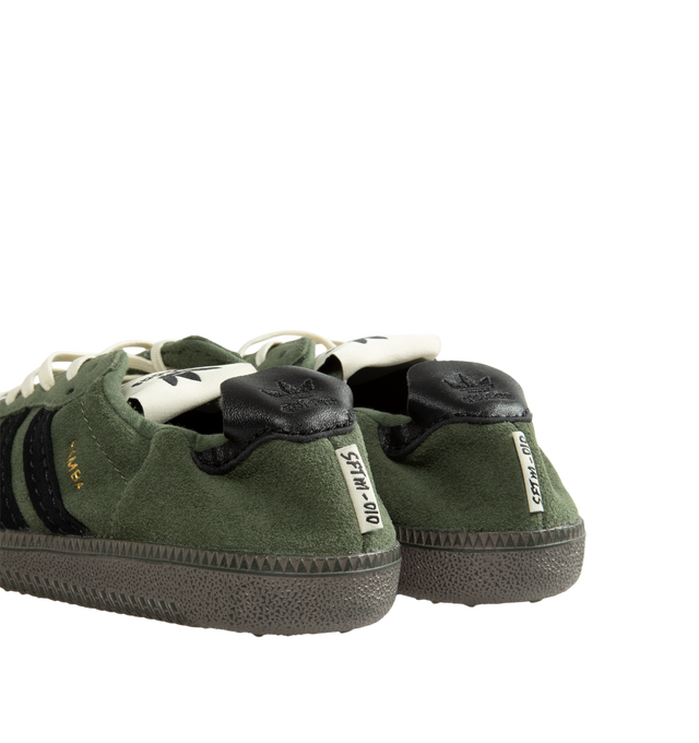 Image 3 of 5 - GREEN - Adidas Originals Men's Samba OG SFTM Shoes are crafted from premium leather and feature a classic low-profile silhouette with lace-up fastening and signature Samba styling. Designed with a smooth textile and synthetic lining for comfort and a durable rubber outsole for everyday traction, this versatile sneaker blends timeless sport heritage with contemporary appeal. Main Material: Leather Upper. Lining: Textile and Synthetic Materials. Outsole: Rubber.
