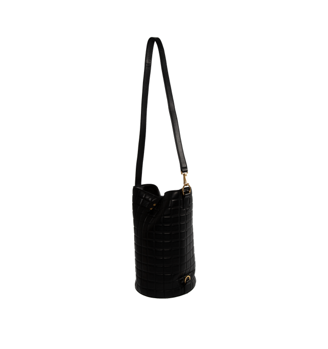 Image 3 of 5 - BLACK - SAINT LAURENT Cecile Duffle Sport featuring barrel bucket bag, quilted topstitching, sliding strap, snap button closure and cotton lining. 7.9 X 12.6 X 7.9 inches. Strap drop: 14.6 inches. 90% lambskin, 10% metal. 