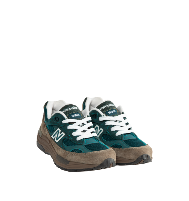 Image 2 of 5 - GREEN - New Balance Made in USA 992 Sneakers feature a timeless silhouette that blends premium craftsmanship with advanced comfort technology. A fan-favorite since its introduction, this seasonal edition showcases a tonal blue upper crafted from breathable mesh and premium suede overlays, contrasted by a black sole unit. ABZORB cushioning at the heel and forefoot provides exceptional impact absorption, while the ENCAP and C-CAP midsole combination delivers lightweight support and stability. F