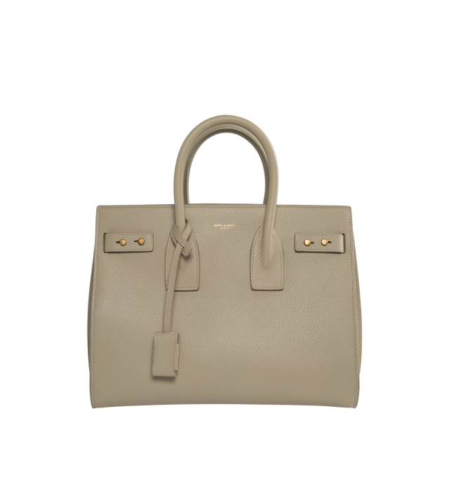 Image 1 of 2 - NEUTRAL - SAINT LAURENT Sac De Jour Small in Supple Grained Leather featuring suede lining, accordion sides, detachable padlock in leather case, interior zipped pocket, five metal feet and detachable shoulder strap. 12.5 X 10 X 6.1 inches. 95% calfskin leather, 5% metal. Made in Italy.  