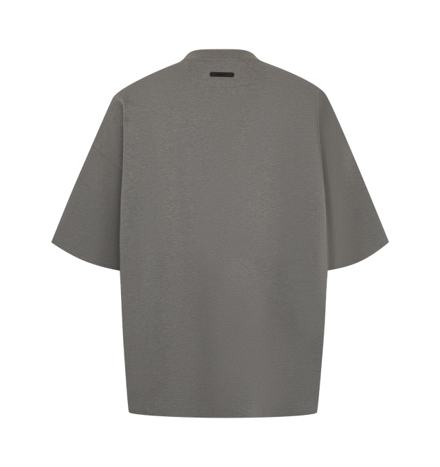 Image 2 of 2 - GREY - Fear of God ESSENTIALS Men's Signature 90s Relaxed Tee is crafted from a medium-weight cotton-blend pique knit and features an oversized 90s-inspired silhouette with dropped shoulders and relaxed proportions. Designed with minimalist branding, this elevated everyday essential is finished with an embroidered signature logo at the front, a rib-knit crew neckline, and a signature label at the back collar. Main Material: 80% Cotton, 20% Polyester, 265 GSM.