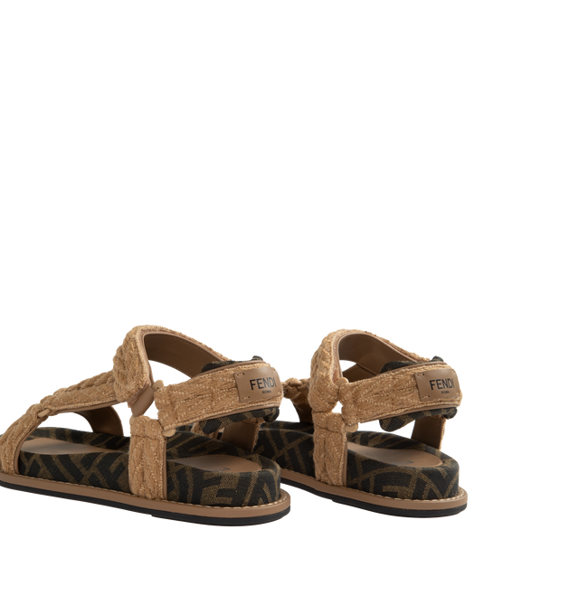 Image 3 of 4 - NEUTRAL - FENDI Feel Slides have intersecting bands, embellished footbed, and signature brand lettering fabric. 70% cotton, 17% polyester, and 13% other fibers.  