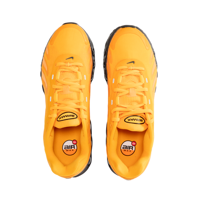Image 5 of 5 - YELLOW - NIKE Air Max Dn8 Sneaker featuring sleek, low-profile package, powered by eight pressurised Air tubes, dual-chambered tubes with tuned pressure levels, full-length Dynamic Air system sits directly on top of the rubber outsole, plush foam, sculpted upper is made from lightweight mesh on top and plastic heel clip.