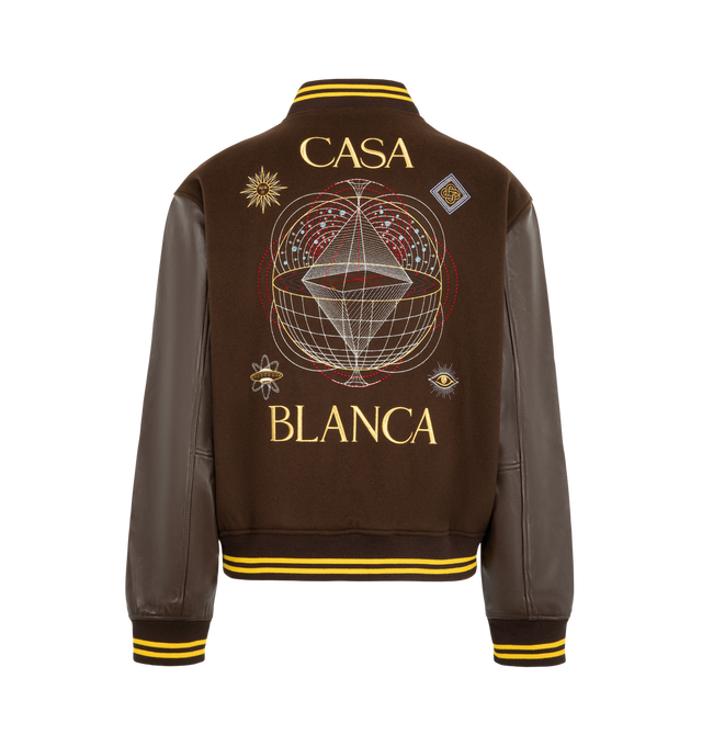 Image 2 of 3 - BROWN - Casablanca Men's Brown Celestial Pyramid Wool & Leather Varsity Jacket is crafted from an Italian wool with lamb nappa leather sleeves and embroidery. Designed in a relaxed silhouette for cold-weather layering, this varsity-inspired jacket is detailed with a button-front closure, branded snap buttons, slanted welt pockets, and classic rib-knit collar, cuffs, and hem finished with yellow stripe accents. Fully lined for comfort, it combines premium materials with Casablanca's distinctiv