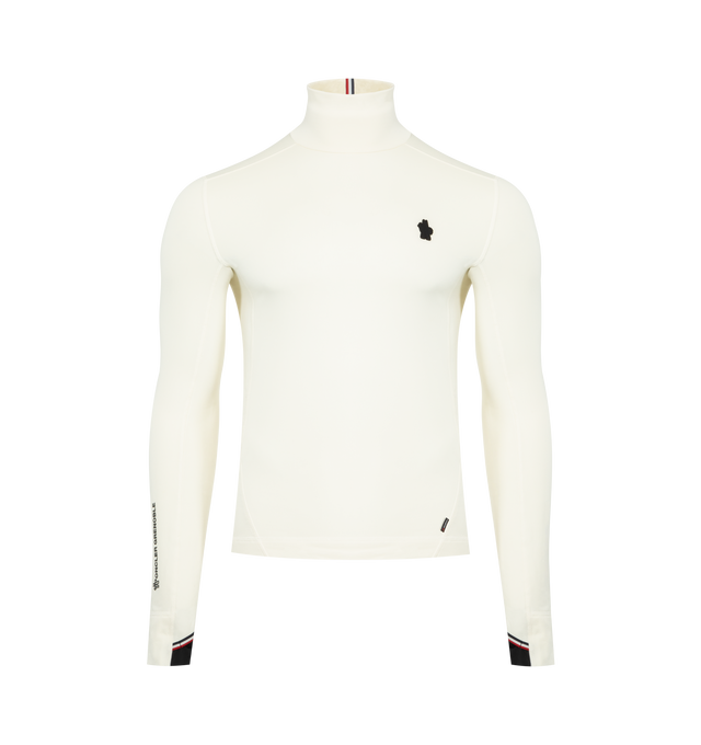 Image 1 of 4 - WHITE - MONCLER GRENOBLE Polartec Turtleneck featuring Polartec Power Grid Rec Base Layer, turtleneck, wrist gaiters, logo details and silicone logo patch. 88% polyester, 12% elastane/spandex. Made in Portugal.