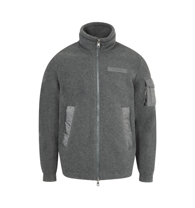 Image 1 of 3 - GREY - MONCLER Fleece Jacket featuring a snap-flap sleeve pocket, two-way front-zip closure, stand collar, elastic cuffs and front welt pockets. 100% polyester. Made in Romania.