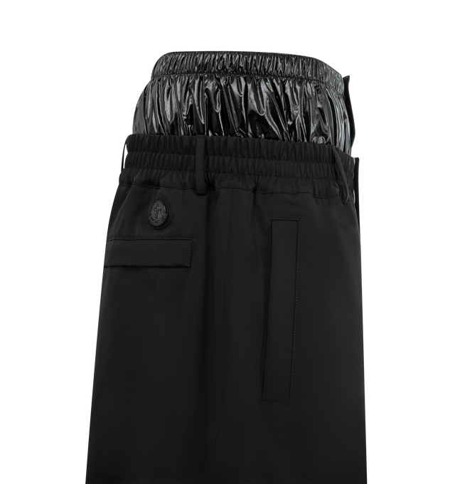 Image 3 of 3 - BLACK - Moncler x A$AP Rocky Logo Print Shorts featuring 3L 4-way stretch nylon, waistband with gaiter, snap button and zipper closure, pockets with snap button closure, logo print and logo patch. 87% polyamide/nylon, 13% elastane/spandex. Padding: 100% polyester.