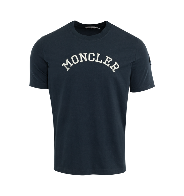 Image 1 of 3 - BLACK - MONCLER SS EMBROIDERED LOGO T-SHIRT has a crewneck and embroidered logo arches across the chest. 