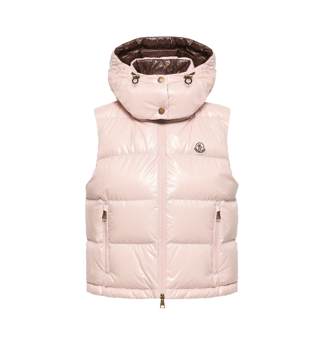 Image 1 of 1 - PINK - Moncler Women's Niverolle Short Down Vest is crafted from glossy nylon and features a down-filled construction, a detachable adjustable hood, a front zip closure, zipped pockets, an adjustable drawstring hem, and the signature logo patch. This designer down vest combines lightweight warmth with versatile functionality for elevated cold-weather layering. Main Material: 100% Polyamide (Nylon). Lining: 100% Polyamide (Nylon). Hood Lining: 100% Polyamide (Nylon). Padding: 90% Down, 10% Fea