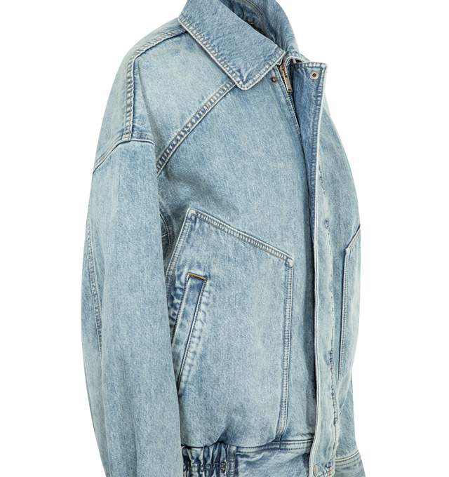 Image 3 of 3 - BLUE - SAINT LAURENT Oversized Zip Denim Jacket featuring drop shoulders, patch pockets, shirred hems at the side, concealed front zip closure with snap-button flap, two welt patch pockets at the front, pointed collar, one-button cuffs and shirred waistband at the sides. 100% cotton. Made in Japan.