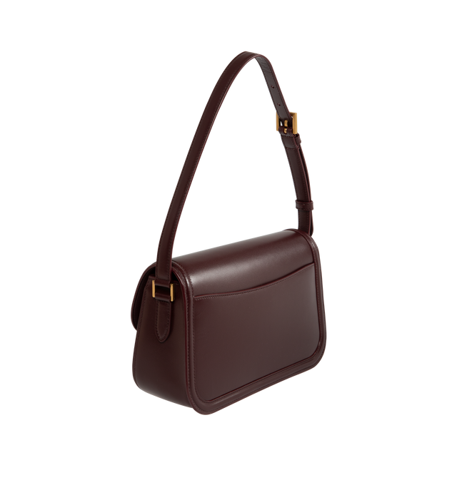 Image 2 of 3 - RED - SAINT LAURENT Solferino Medium Bag in box leather with a cassandre closure, fully lined in leather, rounded lines, adjustable strap for shoulder wear, suede lining, bronze-toned hardware and sliding clasp closure. 9.6" x 5.9" x 3.3". Strap drop: 8". Lambskin. Made in Italy.