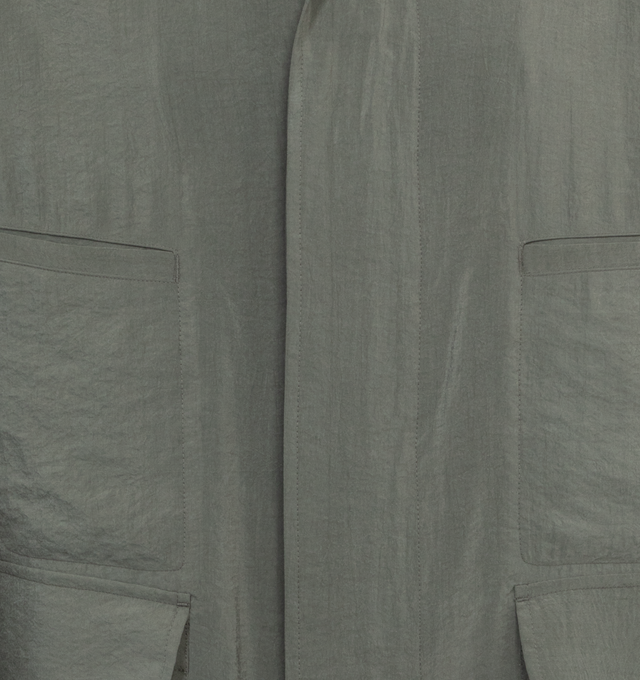 Image 3 of 3 - GREY - LEMAIRE 4 Pocket Overshirt in Dry Silk featuring loose fit, corozo buttons, buttoned cuffs, two flap pockets and two piped pockets. 76% silk, 24% polyamide/nylon. 