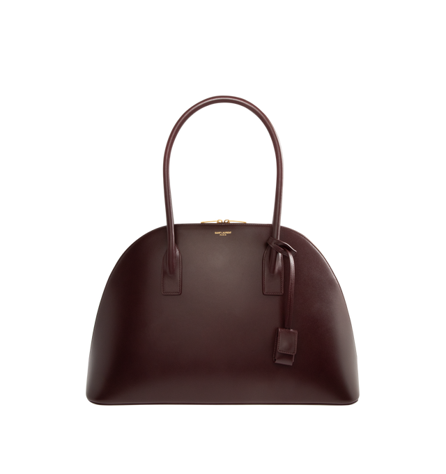 Image 1 of 3 - RED - SAINT LAURENT Sac De Jour Duffle featuring half-moon shape, full zip closure, elongated straps, providing both hand and shoulder carry options, leather lining, bronze-tone hardware, one zip pocket and five metal feet. 16.5" x 10.8" x 0.84.7". Calfskin leather. Made in Italy.