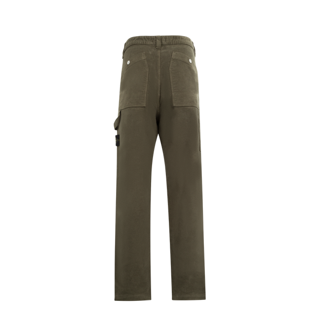 Image 2 of 3 - GREEN - STONE ISLAND Loose Fit Trousers featuring slanted hand pockets, small pocket on right side under waistband with snap, back patch pockets with slanted entrance and snap, tape loop under left pocket, small vertical pocket with snap on back of right leg, Stone Island badge on left leg, zip and button fly and loose fit. 100% cotton.