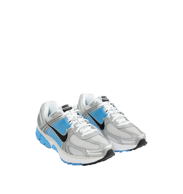 Image 2 of 5 - BLUE - NIKE Zoom Vomero 5 Sneaker featuring synthetic leather on the upper, mesh panels and ventilation ports on the heel, snappy and responsive, Zoom Air cushioning, plastic caging on the side, rubber outsole and reflective details.