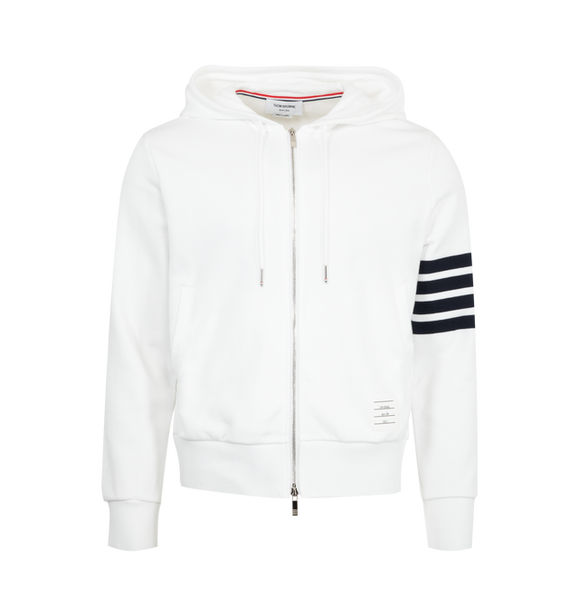 Image 1 of 2 - WHITE - THOM BROWNE Classic Loopback 4 Bar Zip Up Hoodie featuring iconic 4-bar detailing, front zip closure, drawstring hood with silver tone aglets, slip side pockets, name tag applique and signature striped grosgrain loop tab. 100% cotton. Made in Italy.