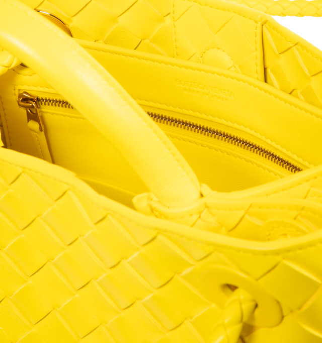 Image 4 of 4 - YELLOW - Bottega Veneta small Andiamo handbag featuring intrecciato leather with leather top handle, sliding cross-body strap, compartmented interior with one zippered pocket, two open pockets and magnetic closure. 7.9" x 9.8" x 3.9". 100% lambskin. Made in Italy.