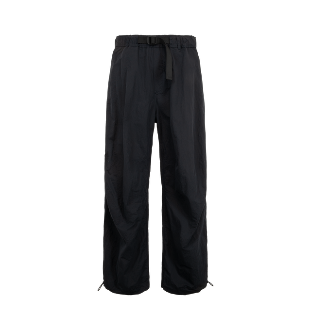 Image 1 of 3 - BLACK - Studio Nicholson Men's Caro Belted Pant is crafted from lightweight, water-repellent technical fabric and features a relaxed silhouette with an elasticated belted waistband and adjustable drawcord hems. Designed for versatile transeasonal wear, the crisp polyamide construction offers lightweight structure and everyday functionality, while the adjustable hems allow the shape to be customized for a more tapered fit. Main Material: 100% Polyamide. Made in Portugal.